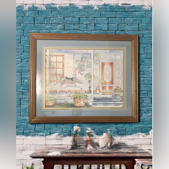 Ava Freeman’s Carousel Horse on Front Porch Framed Print - Picture 1 of 3